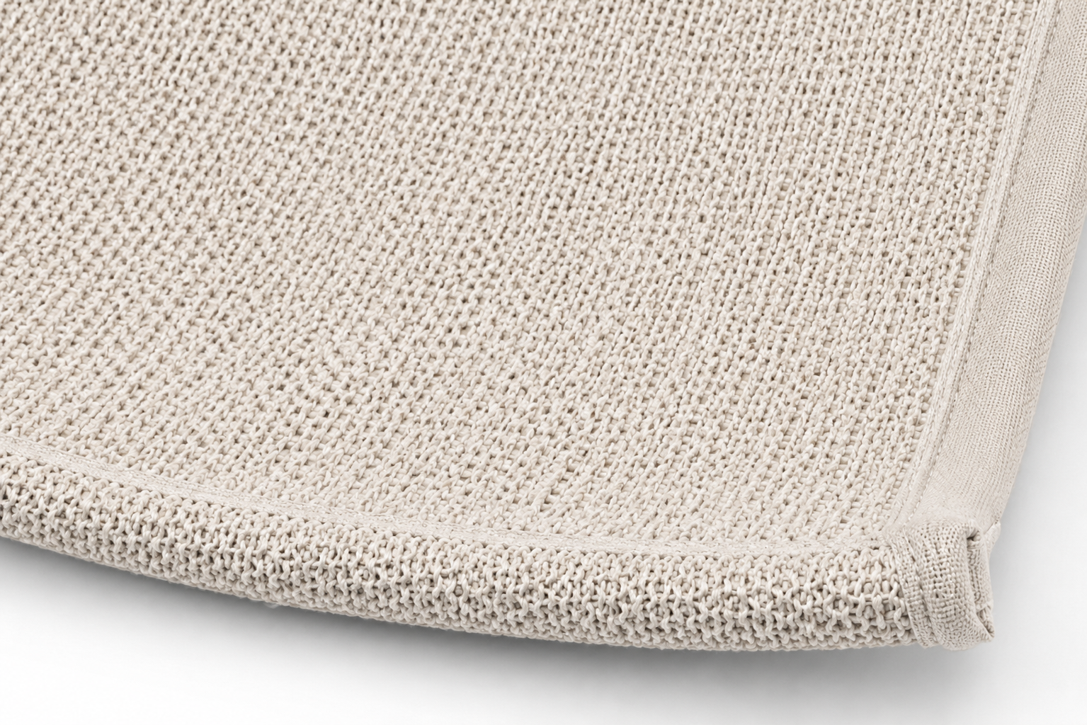 Close-up view of a neatly folded, light beige, textured bath towel edge Window Mounted Cat Hammock Bed with Suction Cup Support for Indoor Use - Image 3