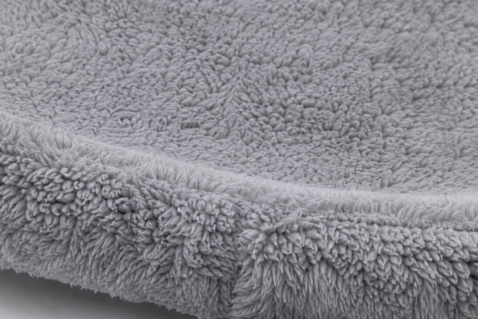 Close-up view of a soft, plush gray fabric with a dense, velvety texture Window Mounted Plush Cat Hammock Bed with Suction Cup Support for Indoor Use - Image 2